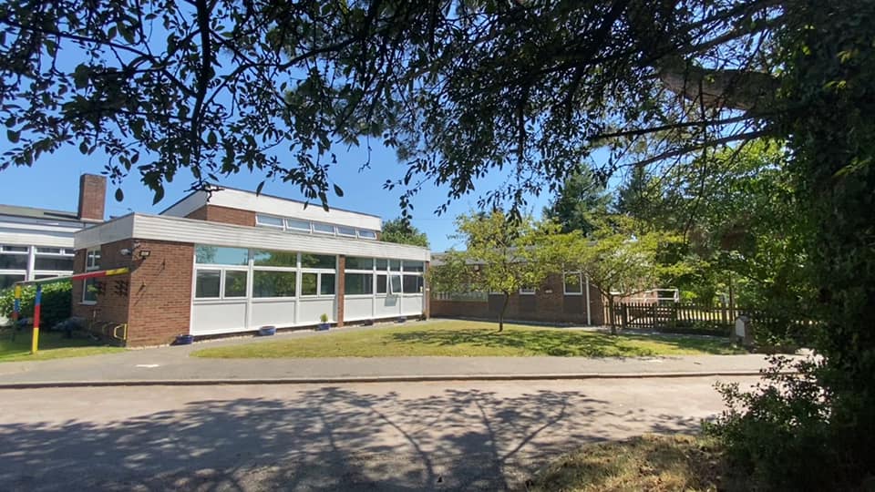 An external photo of the academy building.