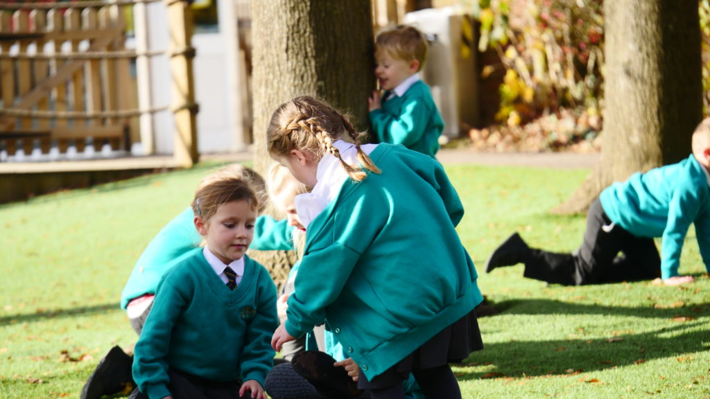 A group of kids playing in the playground.