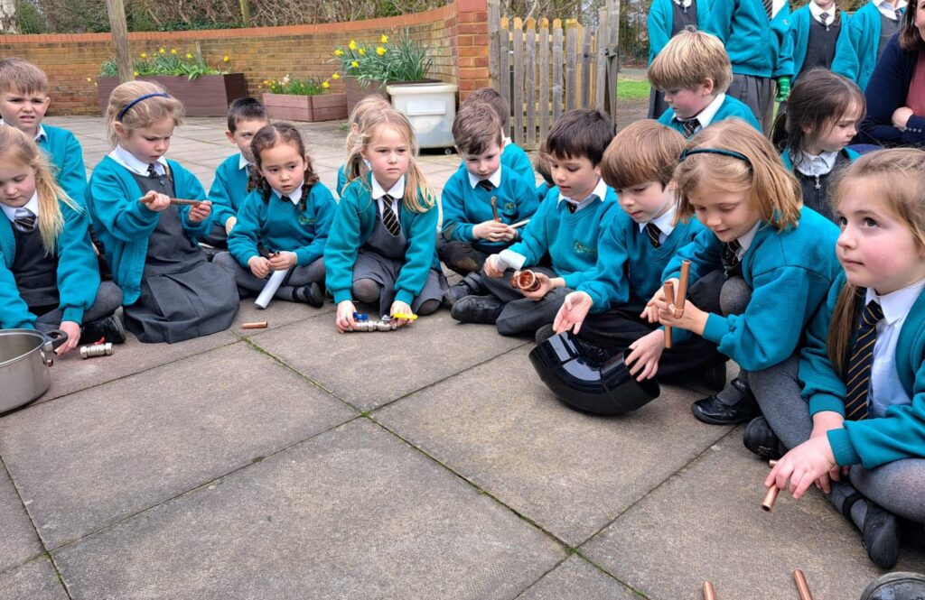 Students sat listening to someone talk